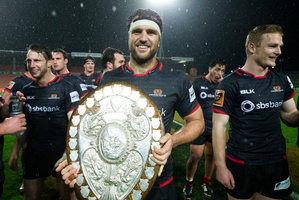 Canterbury captain Luke Whitelock celebrates with the Ranfurly Shield last night following their win over Waikato. Photo / Photosport