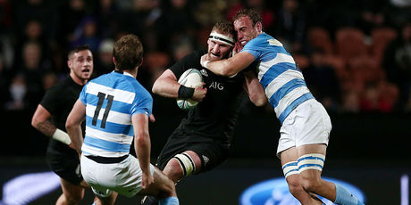 Kieran Read is tackled by Leonardo Senatore during the Rugby Championship. Photo / Getty Images