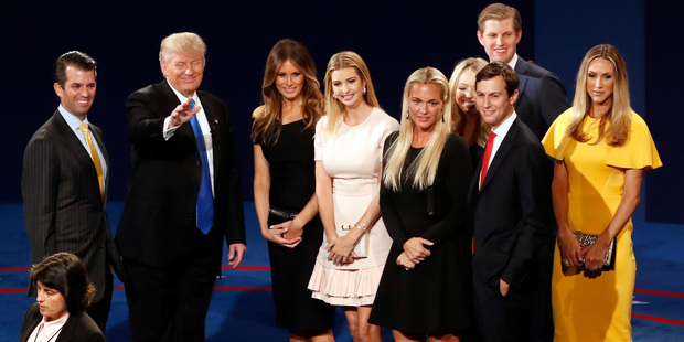 Republican presidential nominee Donald Trump, second from left, his wife Melania Trump, third from left, and family members appear on stage after the presidential debate. Photo / AP
