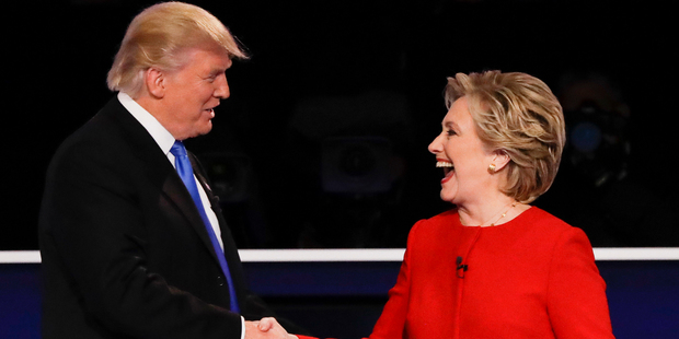 Republican presidential nominee Donald Trump shakes hands with Democratic presidential nominee Hillary Clinton after the presidential debate at Hofstra University. Photo / AP