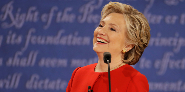 Not all serious: Democratic presidential nominee Hillary Clinton has a laugh during the presidential debate. Photo / AP