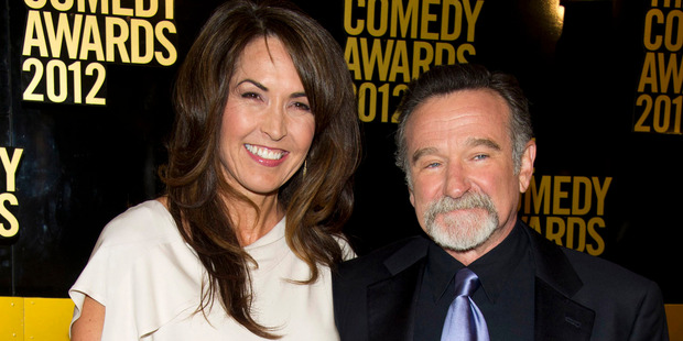 Robin Williams, right, and his wife Susan Schneider arrive to The 2012 Comedy Awards in New York. Photo / AP