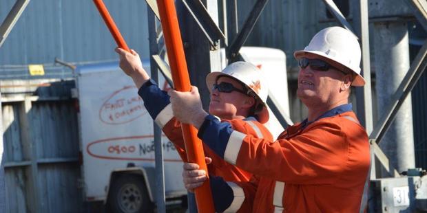 Michelle Burke and Neville Knight at work for lines company NorthPower. Photo / Supplied