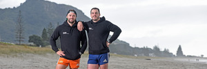 SURF'S UP: Big Dyls (Dylan Cossey), right, from The Block NZ is selling himself for surf lessons, to raise money for a cause close to home. Apprenctice Dylan Guitinck, left, will also be there. PHOTO/GEORGE NOVAK