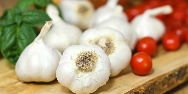 Raw apple or lettuce could be just the trick to cure your garlic breath, say scientists. Photo / File