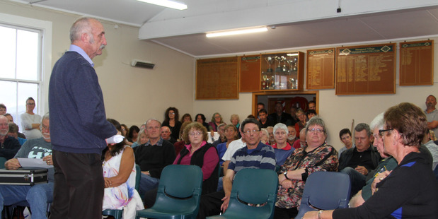 NEXT? Mayor John Carter taking a question from the floor after declaring that Mangonui's boardwalk will have some sort of safety railing.