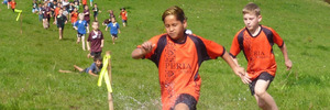 MAKING A SPLASH: Caige Peterson and Noah Thompson-Phimester competed with the 9-year-olds in the Eastern Zone Primary School Cross Country event at Peria. PICTURES/SUPPLIED