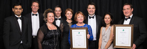 MADE TO MEASURE: Cook Costello representatives with the ACENZ Award of Excellence (from left) Raghu Koushik (software engineer), Phil Cook (director), Maygan Holland (director), Steve Chapman, Debbie Chapman (business development manager), Annette Purvis (IAG), Tim Lawry (IAG), Carmen Tonks and Adrien Tonks (senior civil software engineer). PHOTO/SUPPLIED