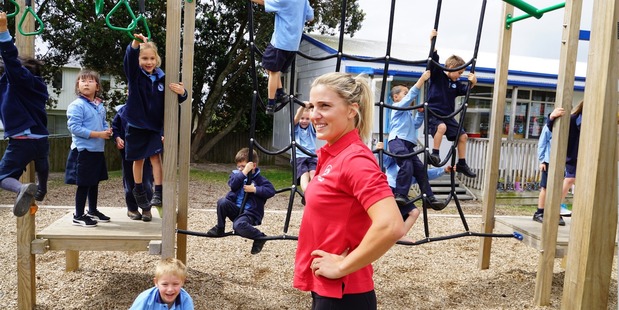 Hockey star Gemma Flynn, pictured at Murrays Bay School in Auckland, is leading a new health programme targeted at kids. Photo / Supplied