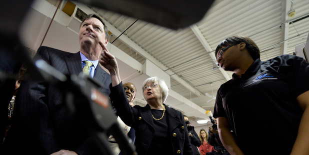 Federal Reserve Chair Janet Yellen, centre, and Federal Reserve Bank of Chicago President and CEO Charles Evans. Photo / Getty