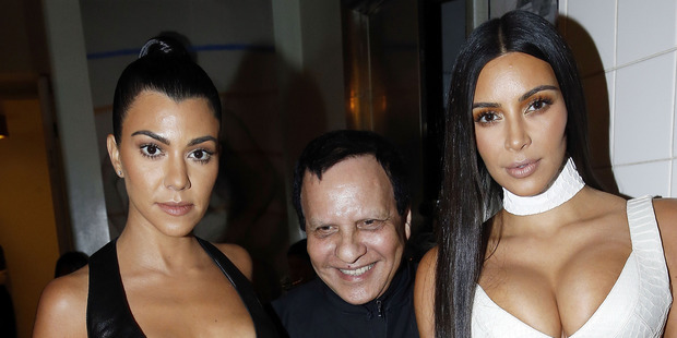 Kim with her sister Kourtney and designer Azzedine Alaia at a private dinner in Paris. Photo / Getty