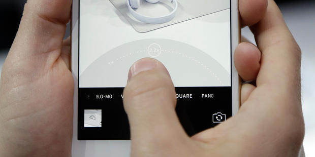 The iPhone 7 Plus camera zoom feature area is shown during an event. Photo / AP