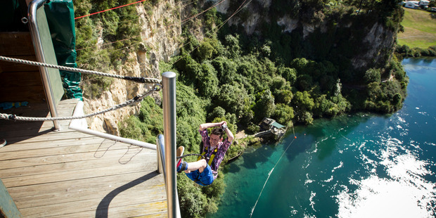 A photo of you bungy jumping posted to Facebook could add to the cost of your insurance premium in the future, says insurance expert Michael Naylor. Photo / Michael Craig