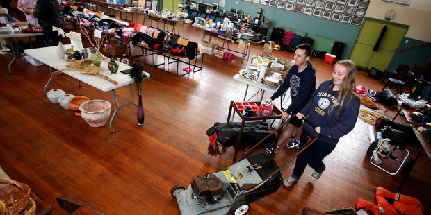 Classics student, Albie Bryce, 16, from Whangarei Boys' High School and Monique Tobin, 16, from Whangarei Girls' get ready for a monster garage sale tomorrow to raise money to go to Italy and Greece.