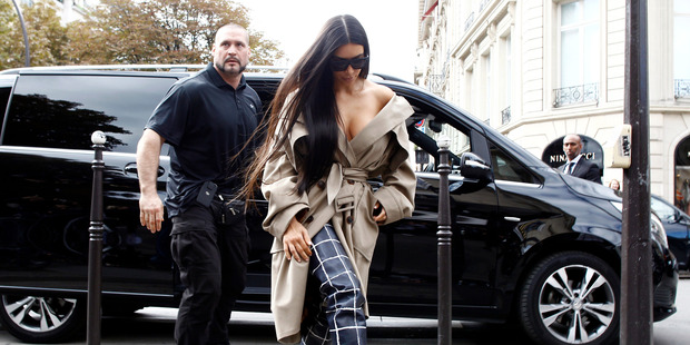 Kim Kardashian with her current bodyguard Pascal Duvier. Photo / Splash News