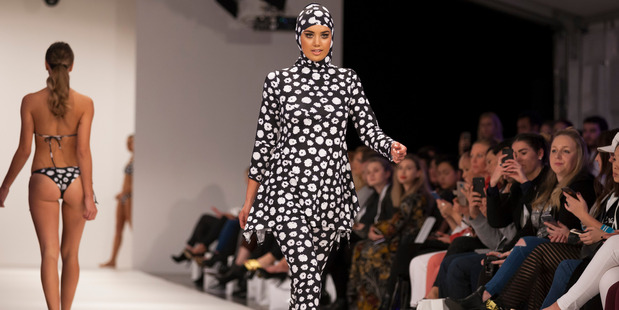 Model Brittane takes the runaway at NZFW, modelling the 'Amal Suit'.