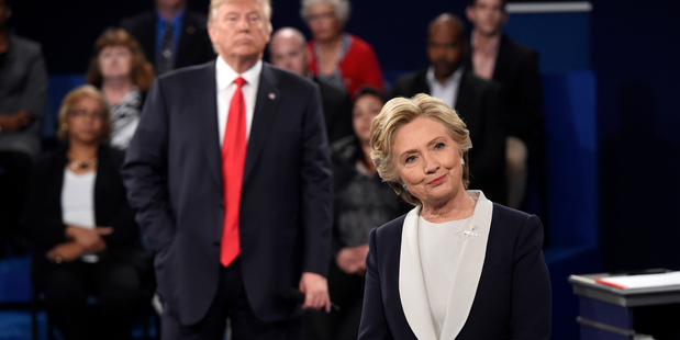 Democratic presidential nominee Hillary Clinton, right, and Republican presidential nominee Donald Trump during the second presidential debate. Photo / AP
