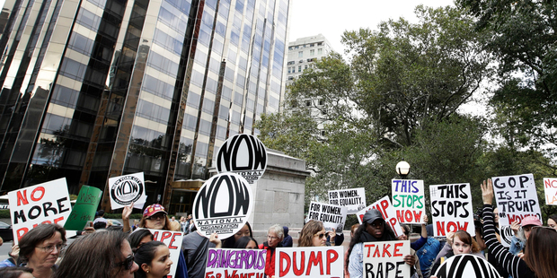 Protesters organised by the National Organisation for Women gather near the Trump International Hotel and Tower. Photo / AP