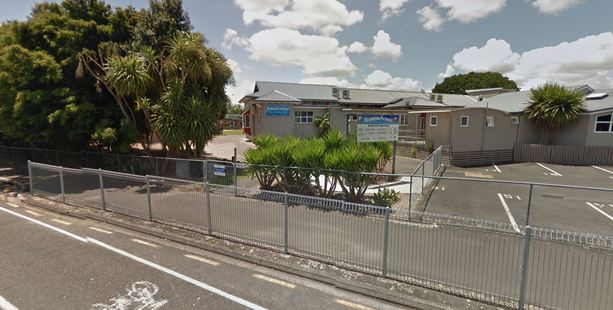 Police are investigating reports of a man "grabbing" a young pupil outside Frankton School on Monday.