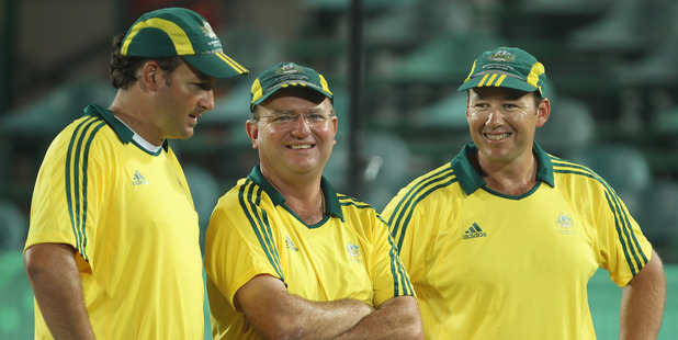 Mark Casey, Wayne Turly and Brett Wilkie of Australia talk it over. Photo / Getty Images