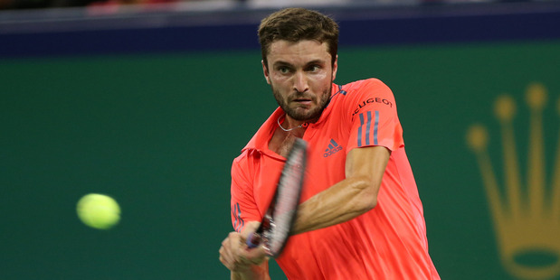 Gilles Simon of France returns a shot against Stan Wawrinka during the Shanghai Masters. Photo / Getty Images