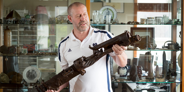 Lode Notredame with a Vickers machine gun found at Passchendaele. Photo / Dean Purcell