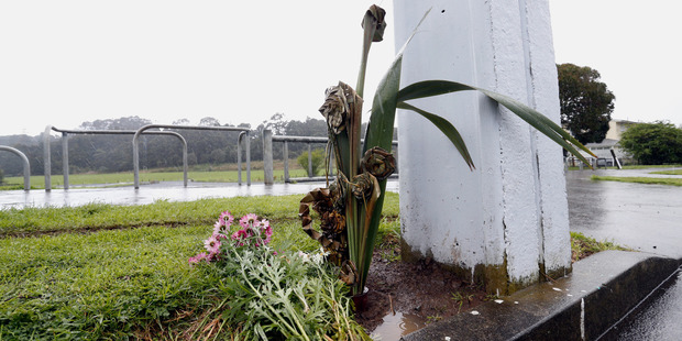 Flax and flowers mark the spot on William Jones Dr in Otangarei. Photo / Michael Cunningham