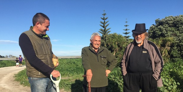 SYMBOLIC: : Piripi Smith (holding the mauri stone) and kaumatua Matiu Eru of Te Matau a Māui Voyaging Trust with Dan Gilbert at today's ceremony. PHOTO/SUPPLIED