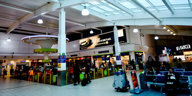 There are few benches that passengers can use for rest at London Luton Airport but there are at least 24-hour dining options. Photo / 123RF