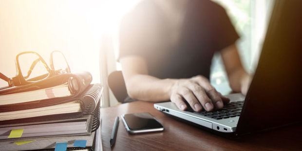The principal was using the school's email and devices for his personal use because of the long hours he was working, he said. Photo / 123RF