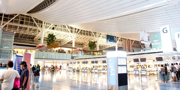 Tokyo Haneda Airport offers its passengers padded seats and benches for rest and some even have privacy screens. Photo / 123RF