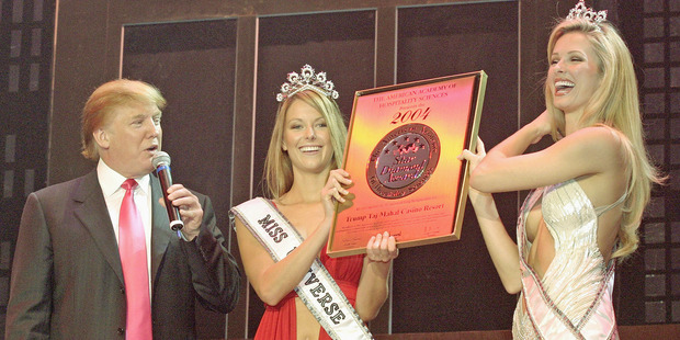 Donald Trump, Miss Universe Jennifer Hawkins and Miss USA Shandi Finnessey attends the Billionaire Birthday Bash for Donald Trump at The Trump Taj Mahal on June 6, 2004. Photo / Getty