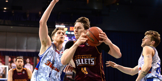 Cameron Bairstow of the Bullets takes on the defence against the Adelaide 36ers. Photo / Getty Images