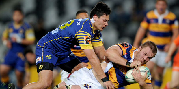 Sio Tomkinson of Otago tackles Sam Cane of Bay of Plenty. Photo / www.photosport.co.nz