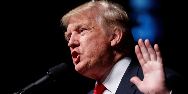 Trump has described comments made in the leaked recording as "locker-room banter". PHOTO/AP