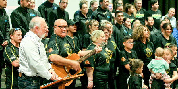 In song: Rex Graham, chairman of the U-Turn Trust sings with founder Henare O'Keefe and the Flaxmere Boxing Academy at the launch of the Flaxmere Calendar heroes for 2017.Photo/Warren Buckland.