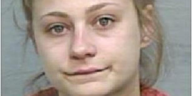 Amy Sharp in a police mugshot taken after her arrest on stealing charges and before her escape. Photo / NSW Police