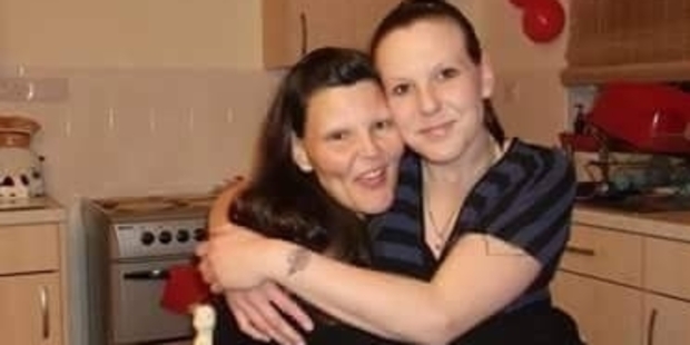 Liz Edwards, left, pictured with her eldest daughter Mary, was killed in her bed. Photo / Facebook