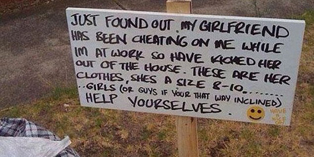 A cuckolded boyfriend packed all his partner's clothes and dumped them outside the house with a helpful sign for passers-by. Photo / Pinterest