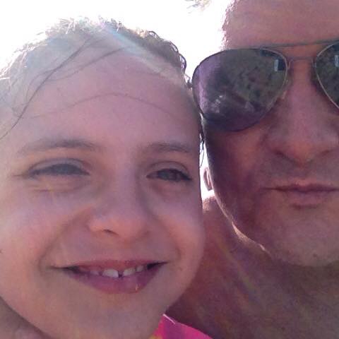 Elisa pictured with her father Fernando Manrique, who is believed to have killed his family. Photo / Facebook