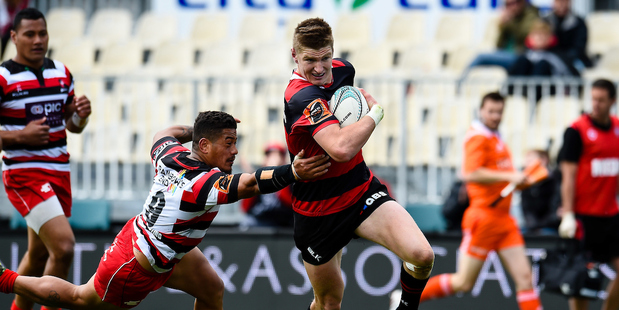 Jordie Barrett of eludes Augustine Pulu for a try. Photo / Photosport