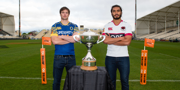 Otago captain Paul Grant and North Harbour captain Chris Vui stand beside the Mitre 10 Cup ahead of their Championship final in Dunedin tomorrow night. Photo / Photosport