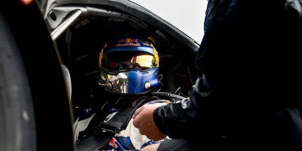 Mad Mike Whiddett speaks to his engineer at the Hampton Downs 101. Photo / Matthew Hansen