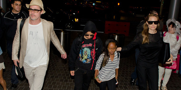 Brad Pitt, Maddox Jolie-Pitt, Zahara Jolie-Pitt and Angelina Jolie are seen at LAX on June 06, 2014 in Los Angeles, California. Photo / Getty