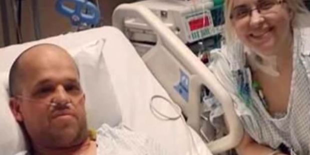 Heather Krueger donned a gown and was placed in a hospital bed at the University of Illinois Hospital. In an adjoining room, Chris Dempsey did the same.