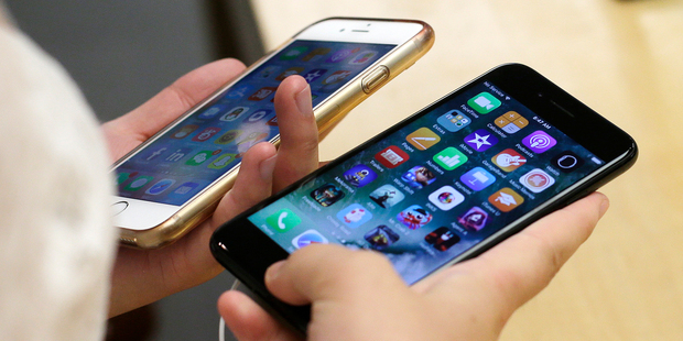 After releasing a new version of its bestselling device, Apple likely sold 45 million units of all types of iPhones in the most-recent fiscal quarter ending September. Photo / AP
