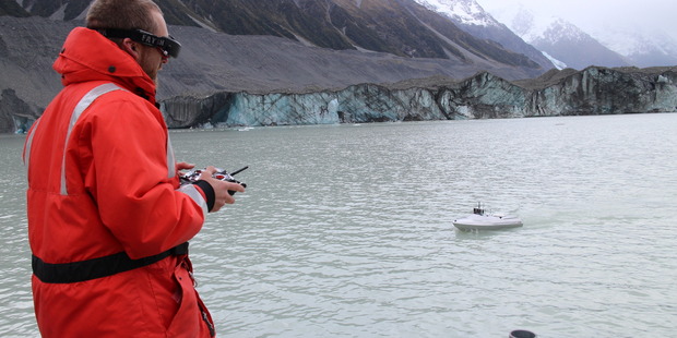 Canterbury University geography technician Paul Bealing operates a miniature high-tech jet boat used to investigate Lake Tasman in the South Island. Photo: Heather Purdie