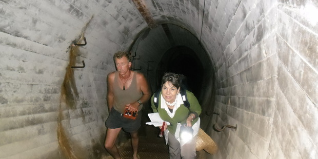 Tourists visiting the 9.2 inch gun battery tunnels at Stony Batter, on Waiheke Island, which DOC closed down about two years ago. Photo / Paul Charman