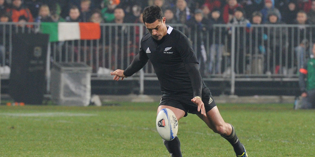 Dan Carter kicks the dropped goal which broke Irish hearts in Christchurch. Photo/ Photosport