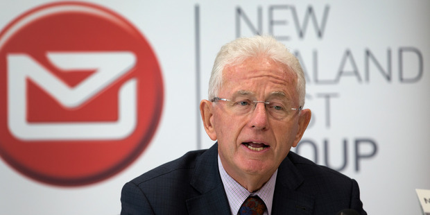 New Zealand Post Group chairman Sir Michael Cullen announcing the company's decision to sell off part of Kiwibank during a press conference in Wellington. Photo / Mark Mitchell